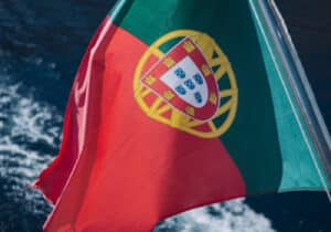 Portugal flag in front the ocean.