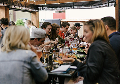 group of people eating in a restaurant