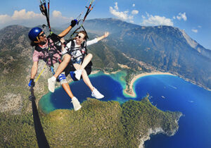 couple paragliding in turkey